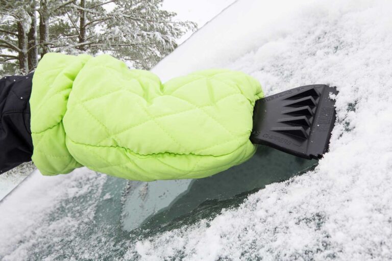 SubZero Premium Ice Scraper Mitt scraping windshield