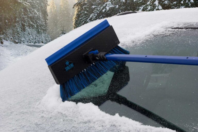 Subzero Power-Force Snowbroom brushing snow from vehicle windshield